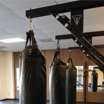 Gym with three boxing bags, boxing in athens ga